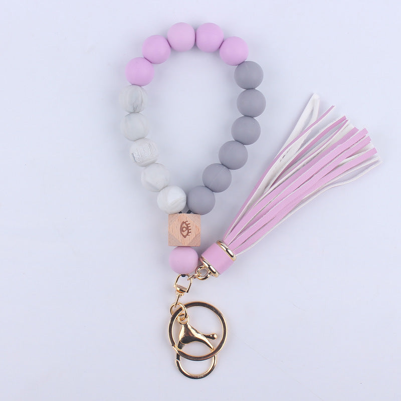 Wholesale Leopard Pattern Silicone Tassel Beaded Wrist Keychain